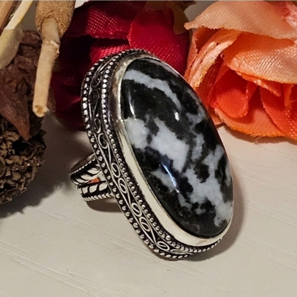 White Buffalo Turquoise Ring represents innocence, purity, strength